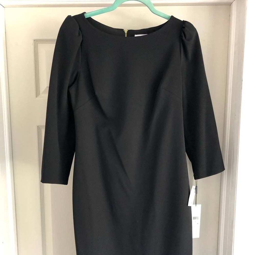 Calvin Klein dress, size 10, color black. Brand new with tag, never used.